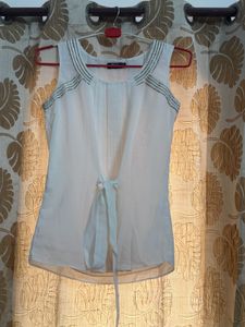 Elegant White Sleeveless Blouse