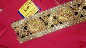 Elegant Pink Saree with Golden Border