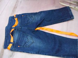 Stylish Blue Denim Capris with Orange Accents