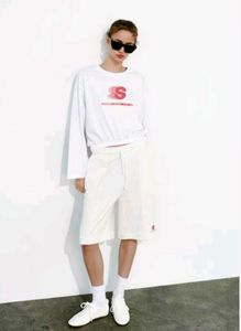 White 'Seattle' Long Sleeve Top from Zara.