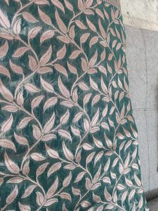 Elegant Teal Saree with Leaf Motif