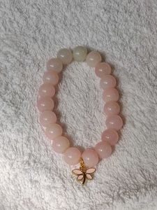 Pink Gemstone Bracelet with a butterfly charm