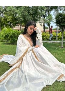 Elegant White Ethnic Gown with Gold Trim