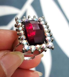 Stunning Red Gem Ring with Sparkly Accents