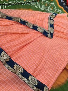 Elegant Peach Saree with Floral Border