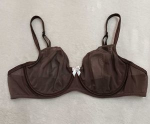 Sheer Brown Bra with White Bow Accent
