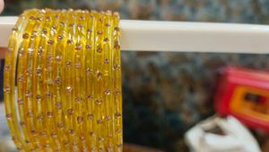 Elegant Yellow Bangles with Sparkling Embellishmen