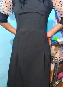 Chic Black Dress with Polka Dot Sleeves