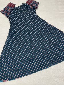 Elegant Teal Kurta Set with Intricate Print
