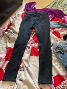 distressed ripped tattered black jeans