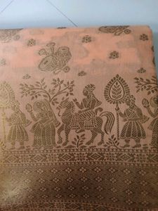 Elegant Peach Saree with Intricate Gold Print