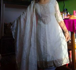 Elegant White Kurta Set with Embellished Neckline