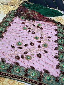 Elegant designer heavy work green  georgette saree