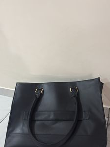 Chic Black Tote Bag with Sunflower Charm