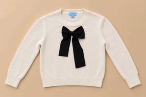 IVORY SWEATER WITH BLACK BOW