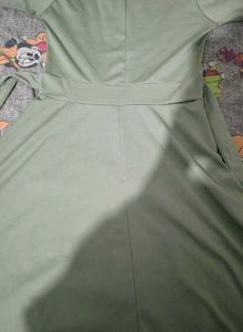 Elegant Light Green Dress with Silver Accents