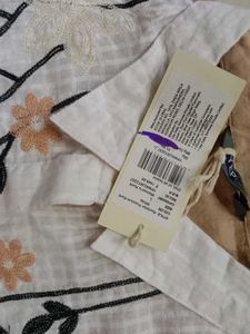 Elegant White Floral Embroidered kurti