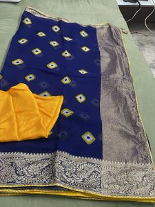 Elegant Blue Saree with Yellow Blouse Piece
