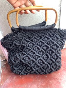 Handmade cord handbag in wooden handle