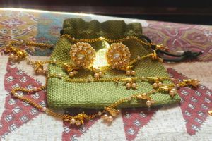 Elegant Gold and Pearl Earring Set with kanchain
