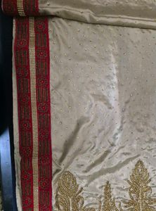 Elegant Beige Saree with Embellishments