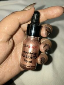 Huda Beauty Liquid Highlighter copper