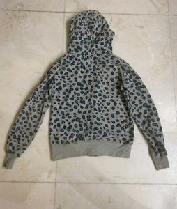 Grey Coloured Animal Print Hoodie From Zudio.
