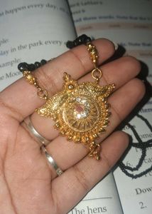 Mangalsutra. Exquisite Gold Necklace with Red Ston