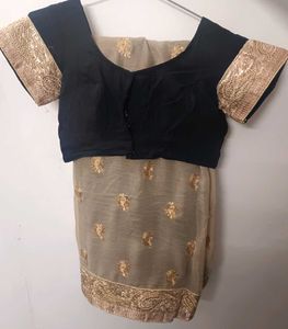 Elegant Embroidered Golden Black Heavy Saree