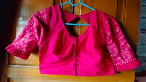 Vibrant Pink Blouse with Elegant Sleeves