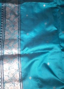 Elegant Teal Saree with Intricate Border