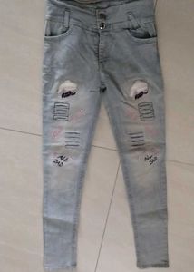 Light Wash Distressed Jeans with Patches