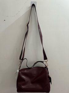 Theatre Burgundy Satchel Bag.