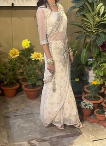 Elegant Off-White Embellished Lehenga Choli