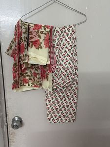 worn only once. Beautiful Floral Kurta Set urge
