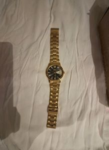 LOIS CARON Gold Pleated Watch For Men..