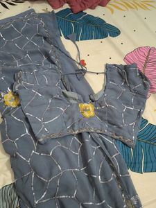 Elegant Grey Saree with Silver Details