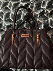 Black quilted handbag