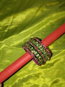Exquisite Kundan & Emerald Bangles Set