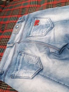 Blue Slim Fit distressed jeans