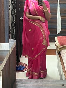 Elegant Pink Saree with Golden Detailing