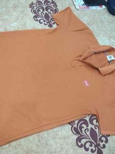 A relaxed Orange Levis T shirt