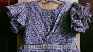 Elegant Purple Pleated Gown with Embellished Belt