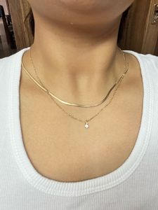 Delicate statement gold necklace