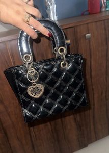 Chic Black Quilted Handbag offer