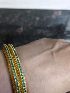 Elegant Gold Plated Bangles with Green Stones