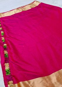 rani pink saree with golden border and tasels