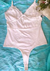 Elegant White Lace Bodysuit