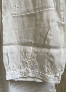 Elegant White Cotton Kurta with Intricate Detailin