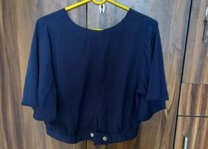 Blue Top With Flared Sleeves..
